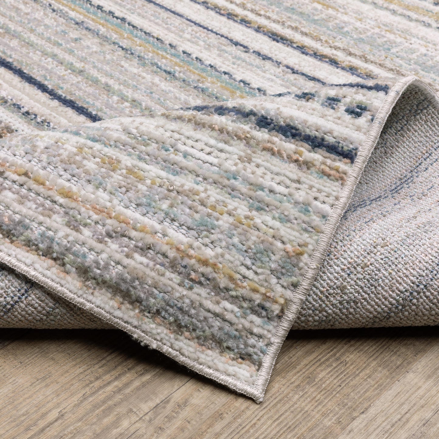 Cavett Stripe Beige/ Multi Distressed Cut Pile Rug