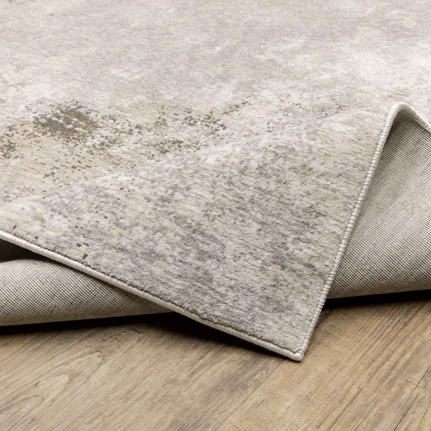 Nebulous Distressed Ivory/ Beige Abstract Cut Pile Rug