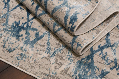 Quartz Traditional Ivory/Blue Distressed Medium Pile Rug