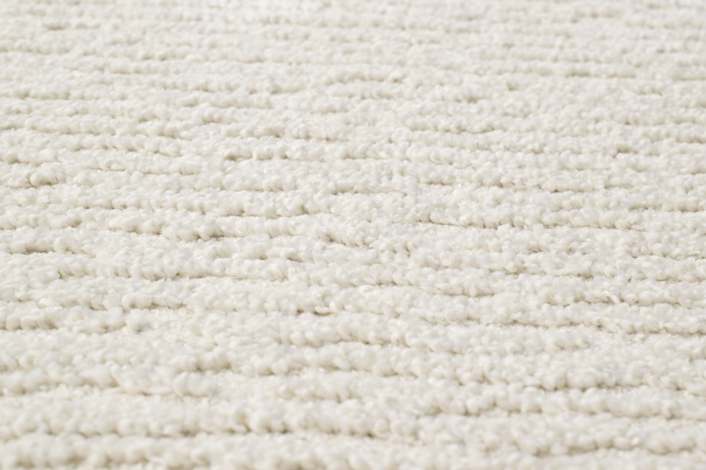 Quin Solid Ivory Solid Color High-Low Rug