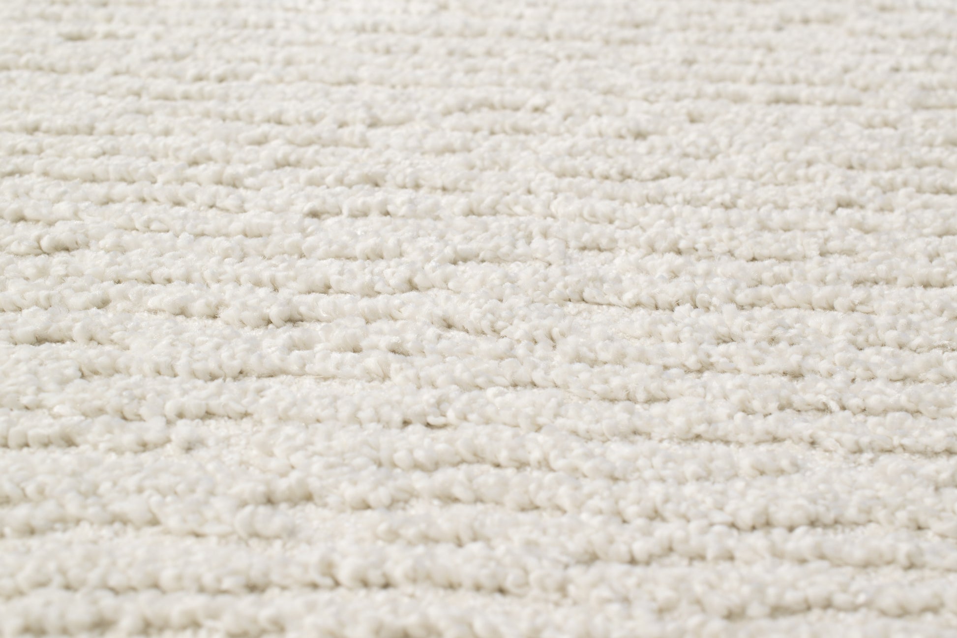 Quin Solid Ivory Solid Color High-Low Rug