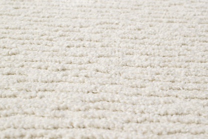 Quin Solid Ivory Solid Color High-Low Rug