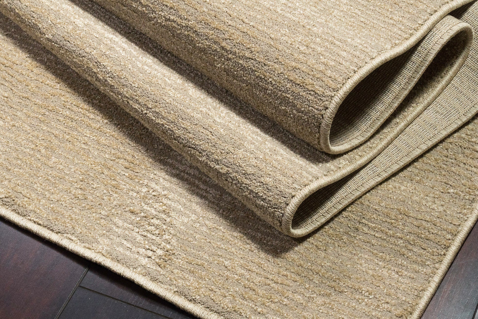Quin Solid Sepia Solid Color High-Low Rug
