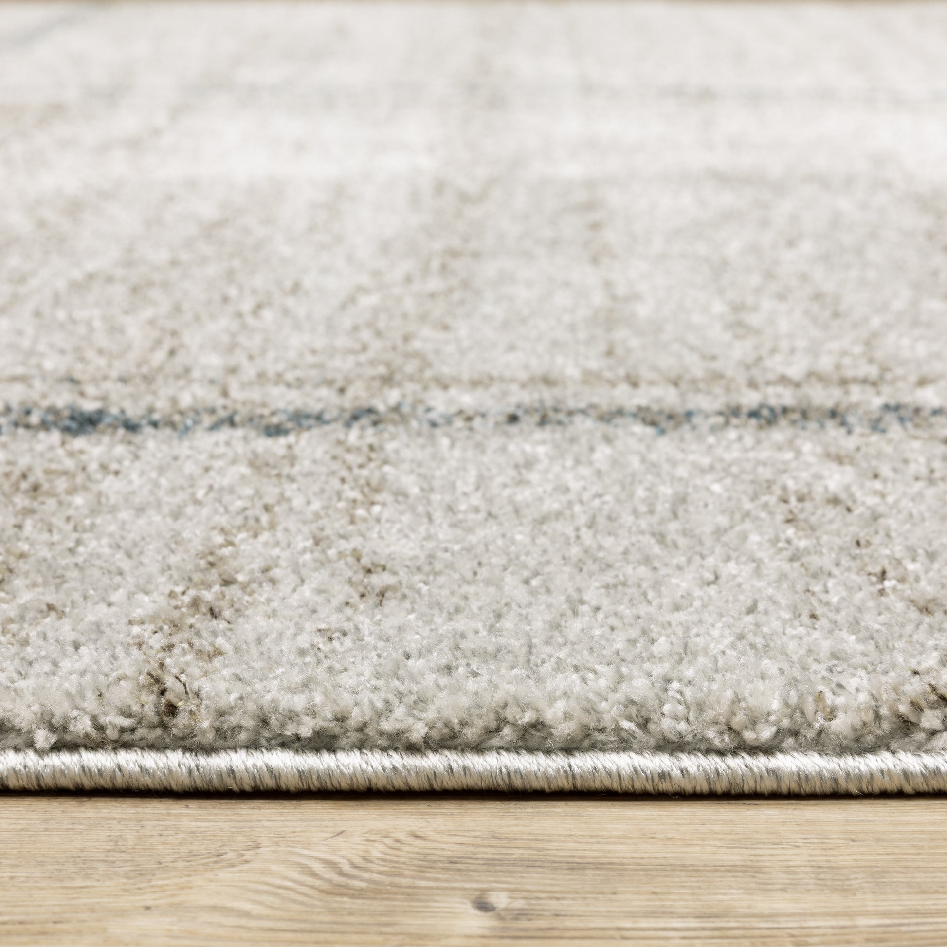 Alton Distressed Beige/ Blue Geometric Cut Pile Rug