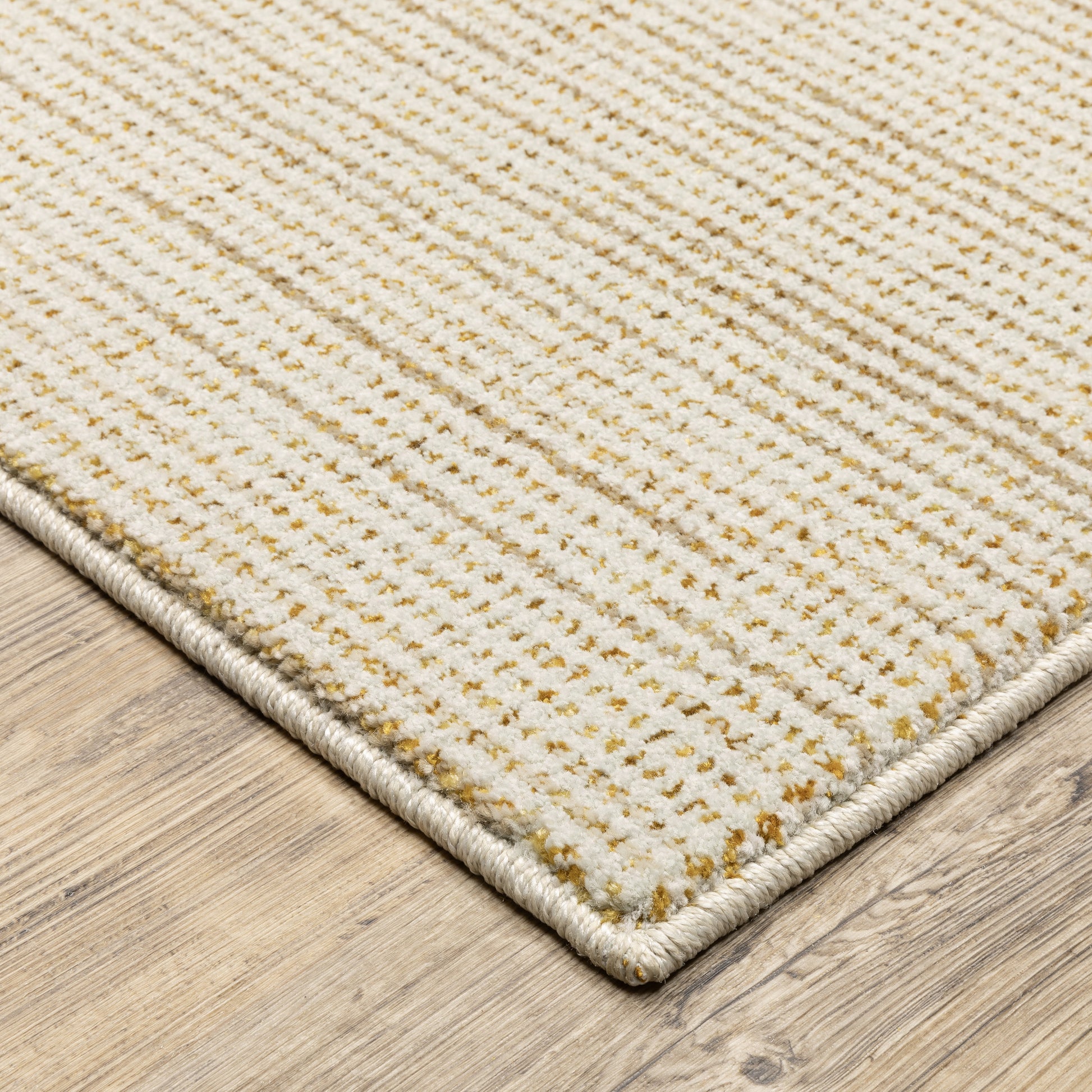 Atlas Distressed Ivory/ Gold Solid Cut Pile Rug