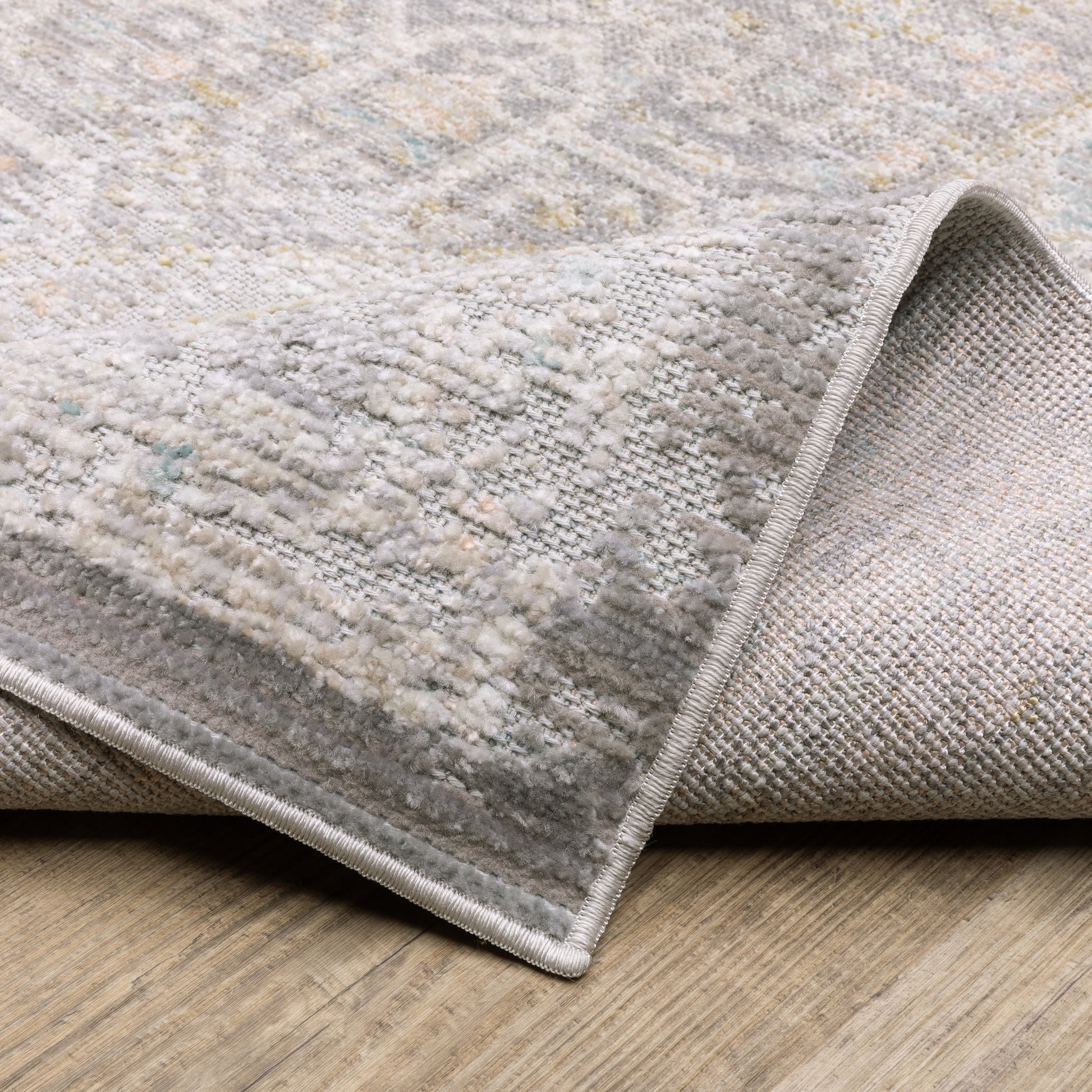 Cavett Distressed Grey/ Orange Medallion Cut Pile Rug