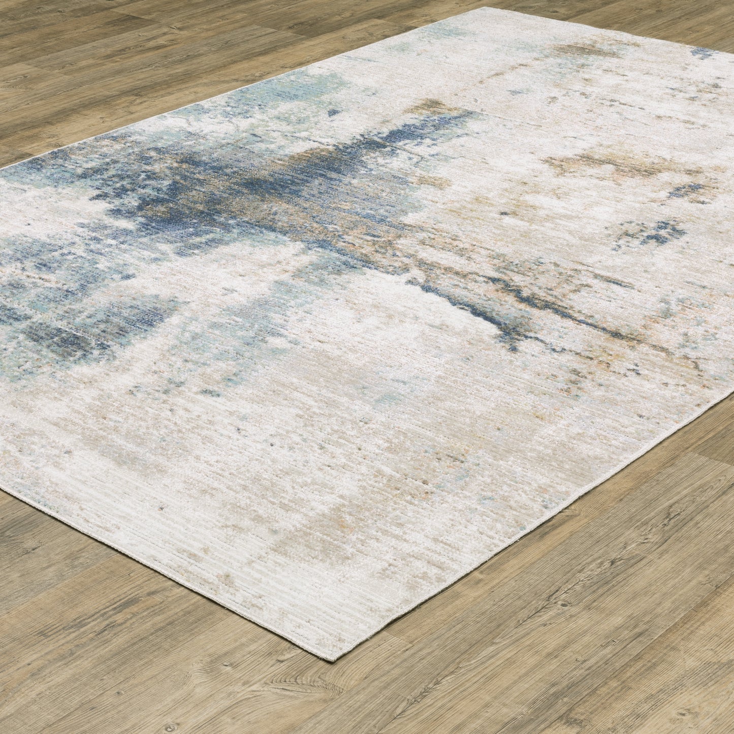 Cavett Distressed Ivory/ Blue Abstract Cut Pile Rug