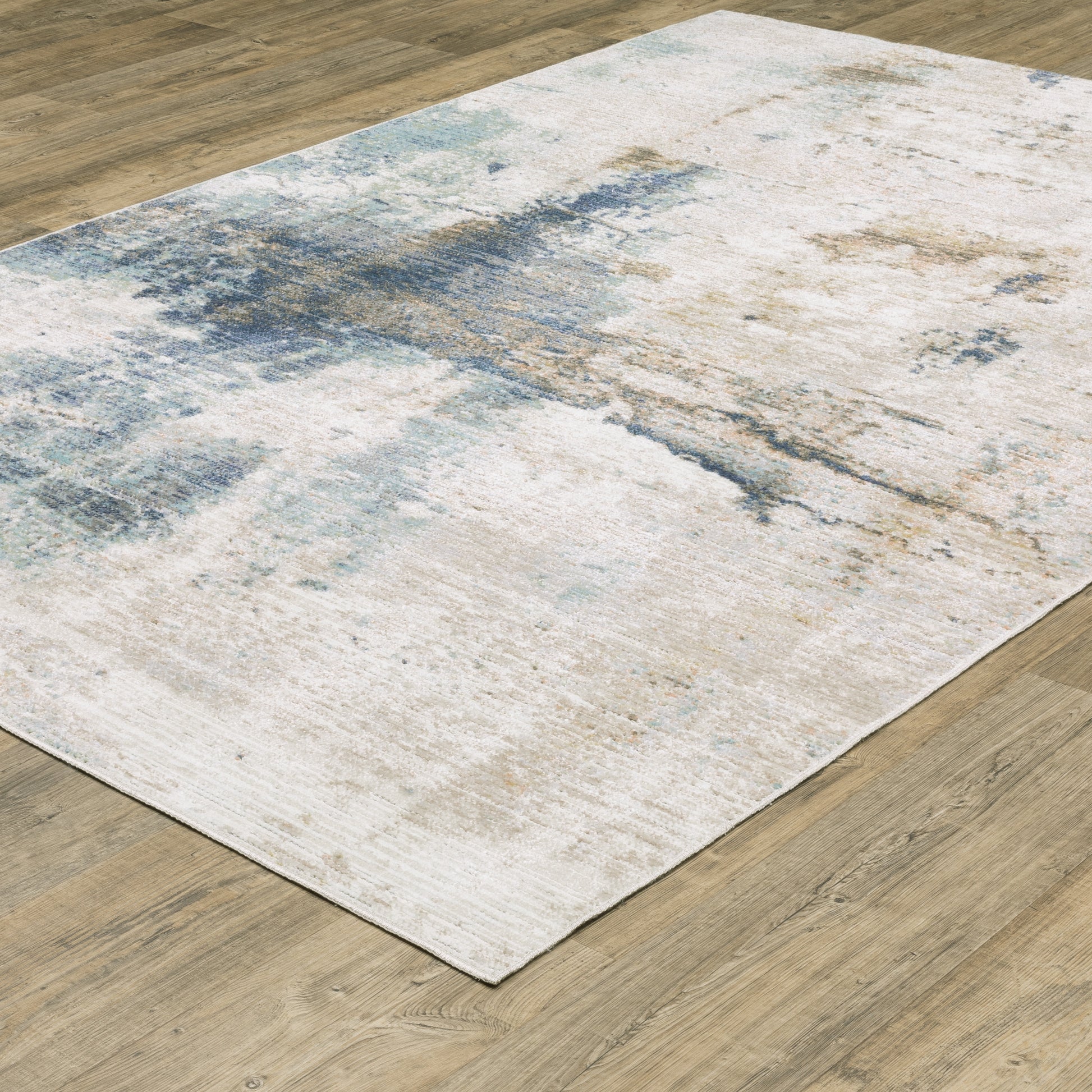 Cavett Distressed Ivory/ Blue Abstract Cut Pile Rug