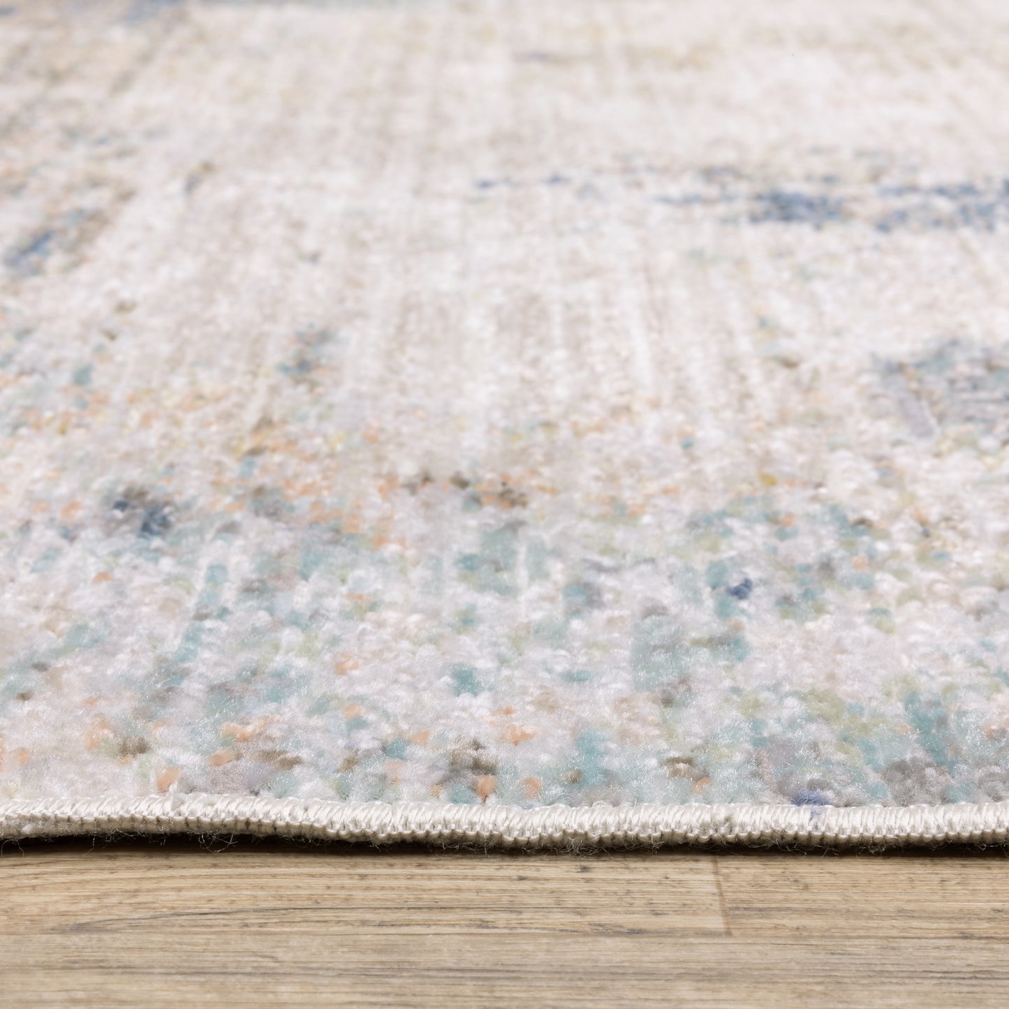Cavett Distressed Ivory/ Blue Abstract Cut Pile Rug