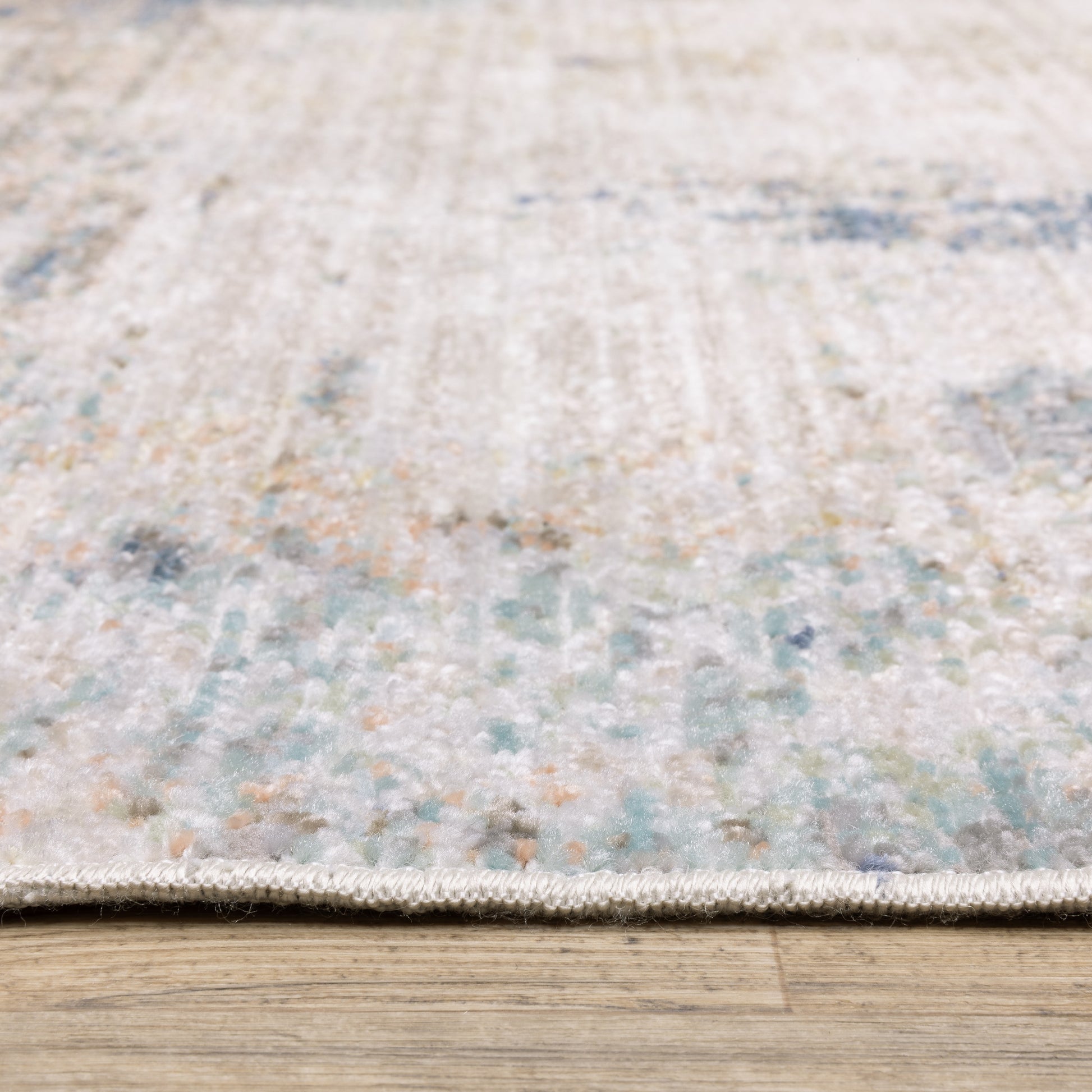 Cavett Distressed Ivory/ Blue Abstract Cut Pile Rug