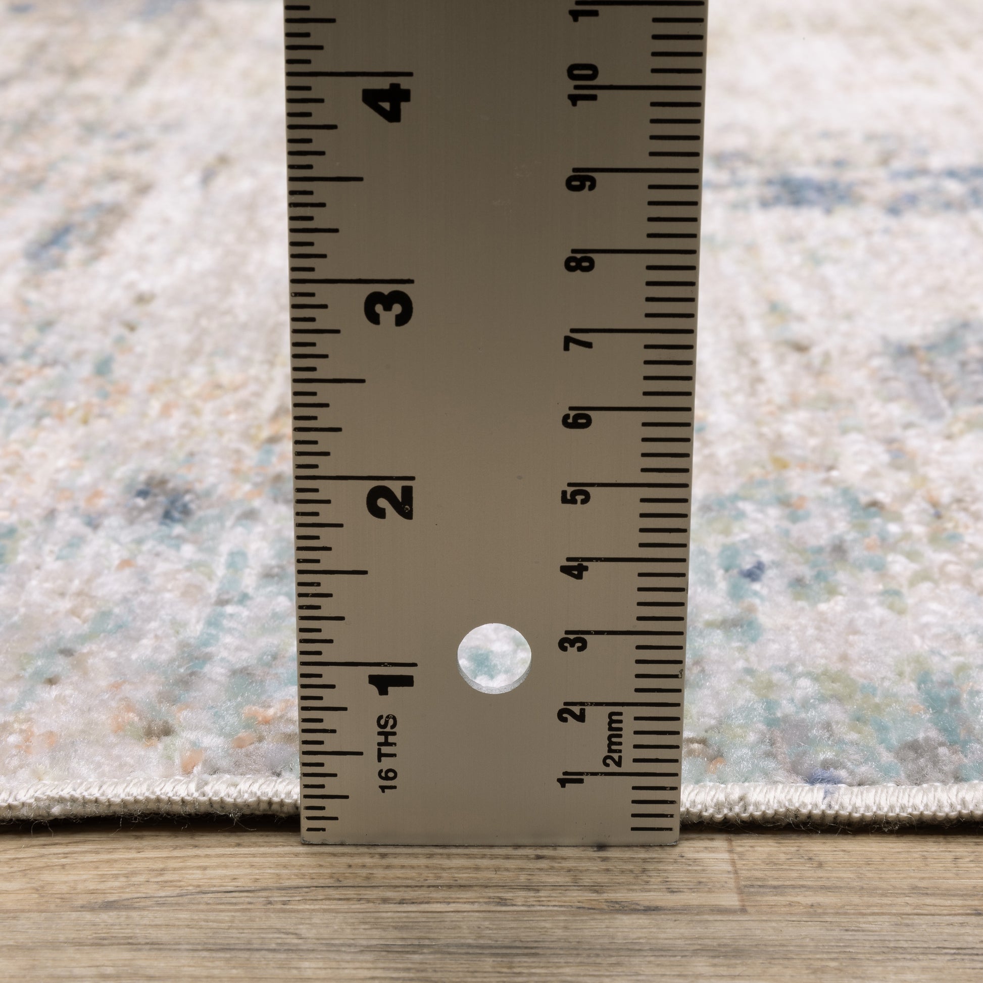 Cavett Distressed Ivory/ Blue Abstract Cut Pile Rug