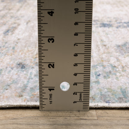 Cavett Distressed Ivory/ Blue Abstract Cut Pile Rug