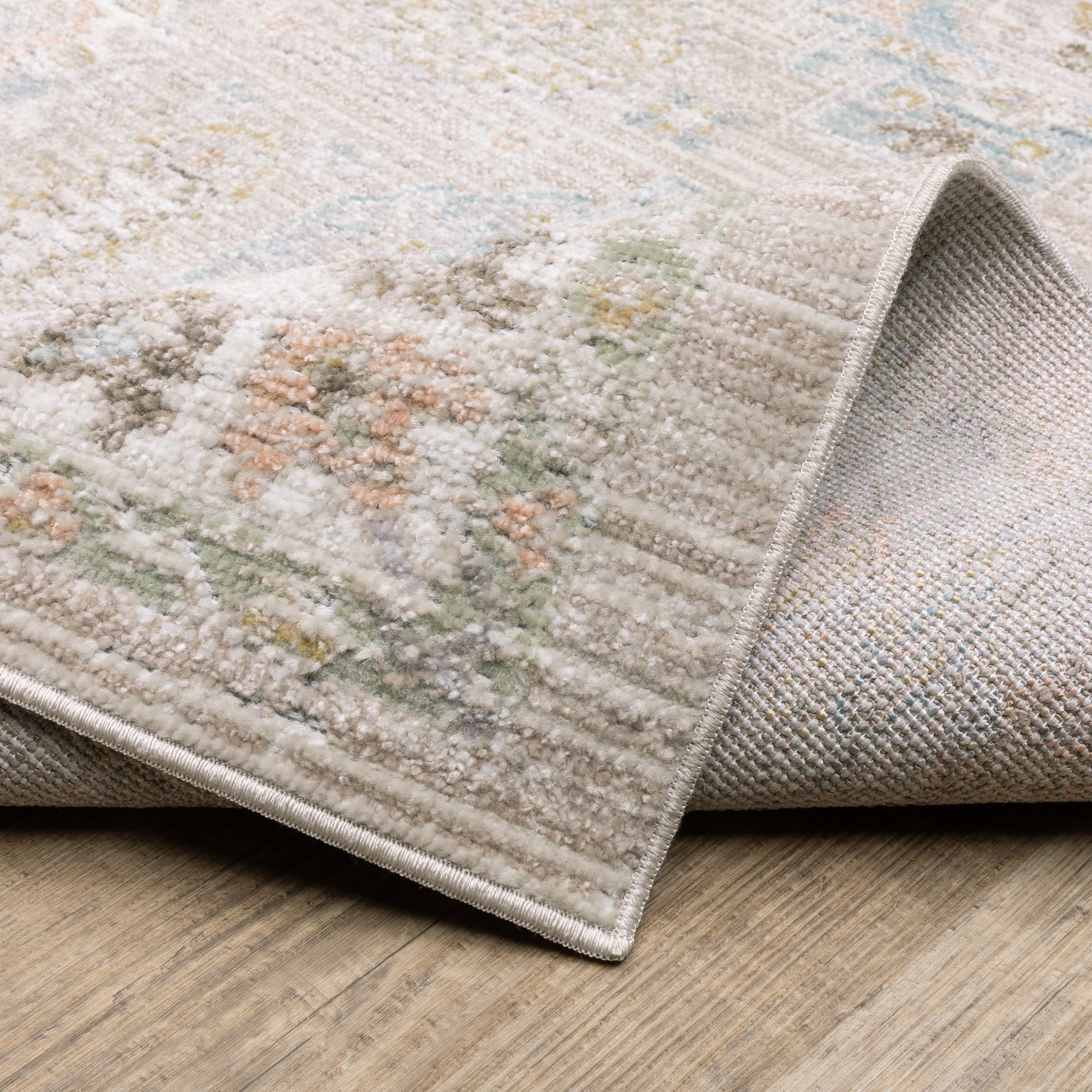 Cavett Floral Beige/ Blue Distressed Cut Pile Rug