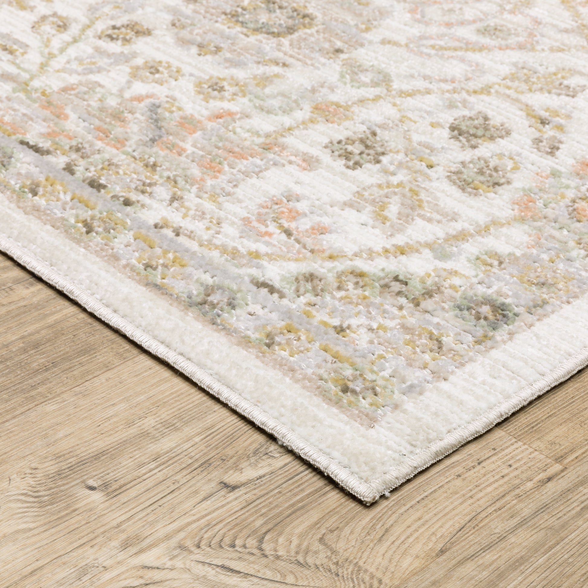 Cavett Floral Ivory/ Gold Distressed Cut Pile Rug