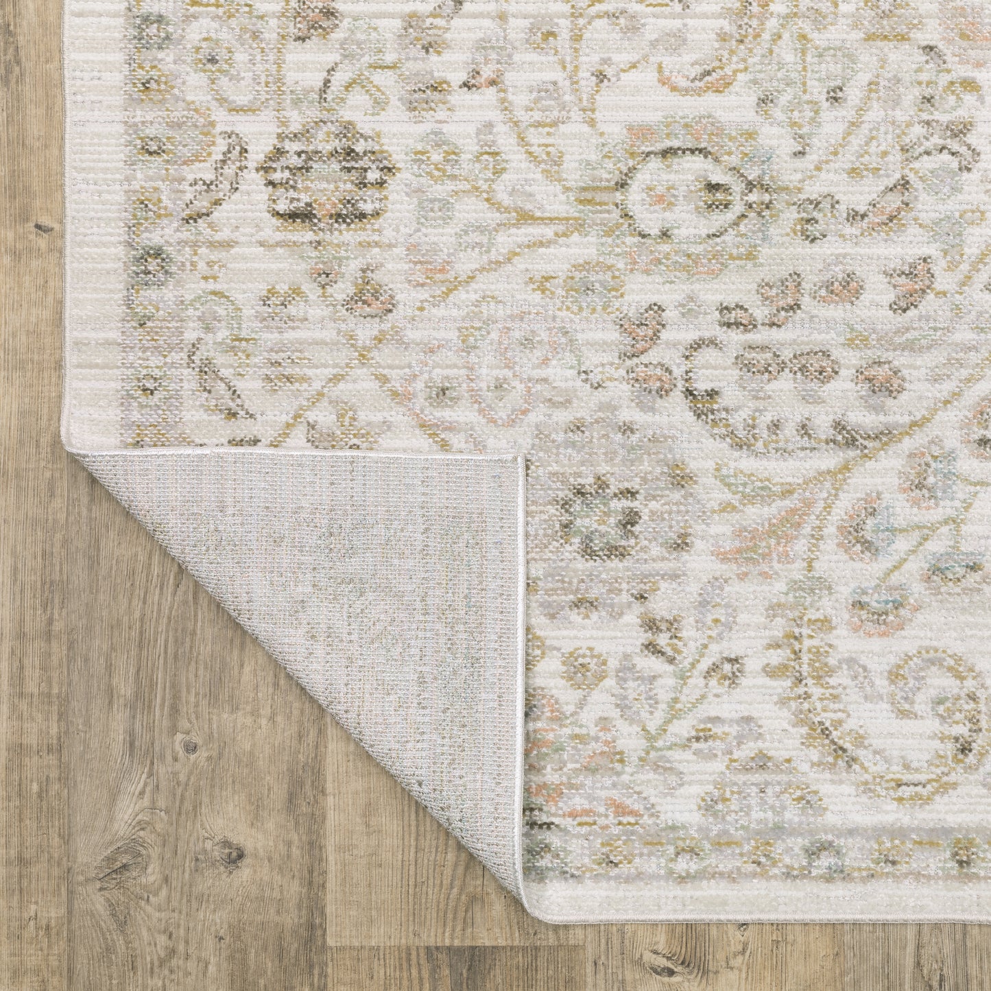Cavett Floral Ivory/ Gold Distressed Cut Pile Rug