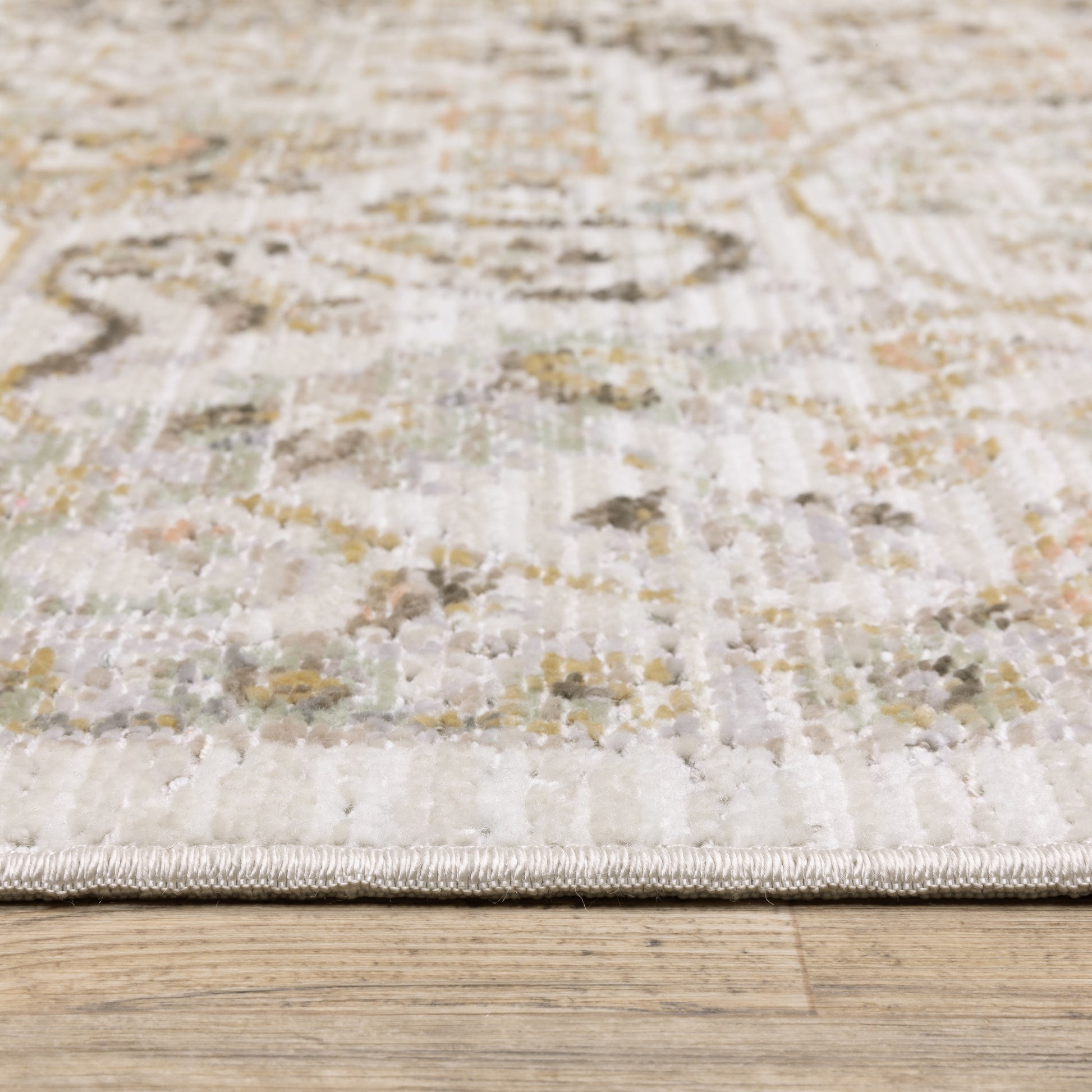 Cavett Floral Ivory/ Gold Distressed Cut Pile Rug