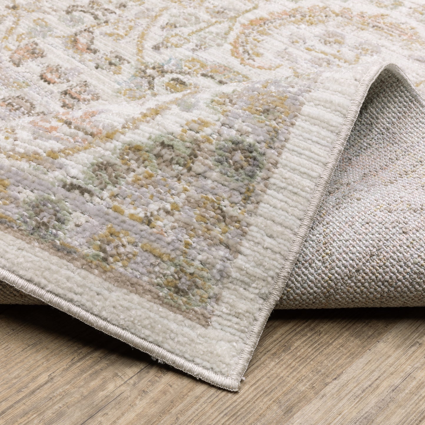 Cavett Floral Ivory/ Gold Distressed Cut Pile Rug