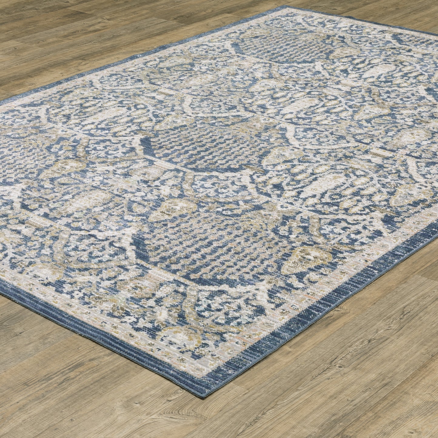Cavett Distressed Blue/ Gold Floral Cut Pile Rug