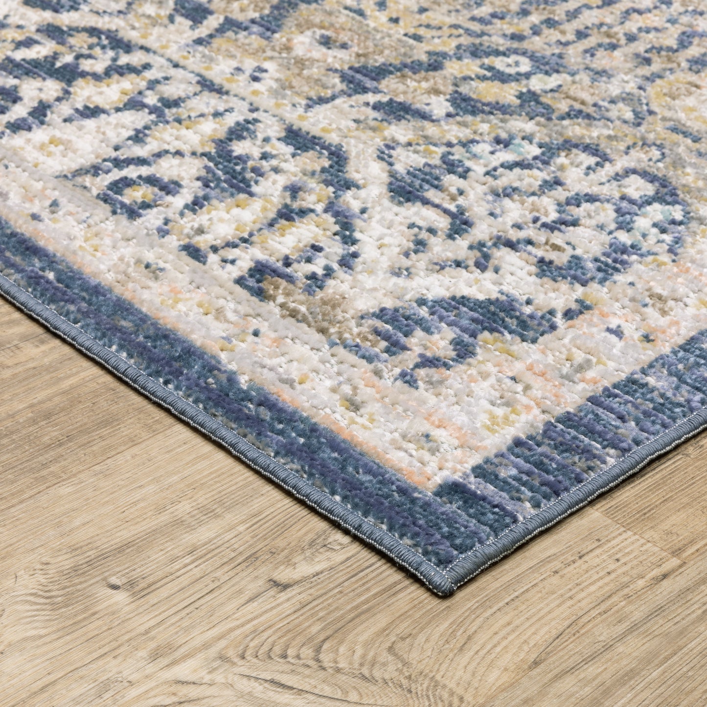 Cavett Distressed Blue/ Gold Floral Cut Pile Rug