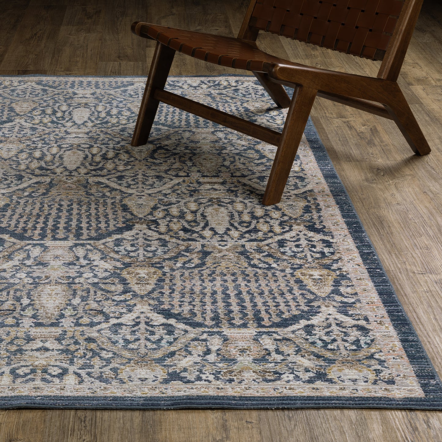 Cavett Distressed Blue/ Gold Floral Cut Pile Rug
