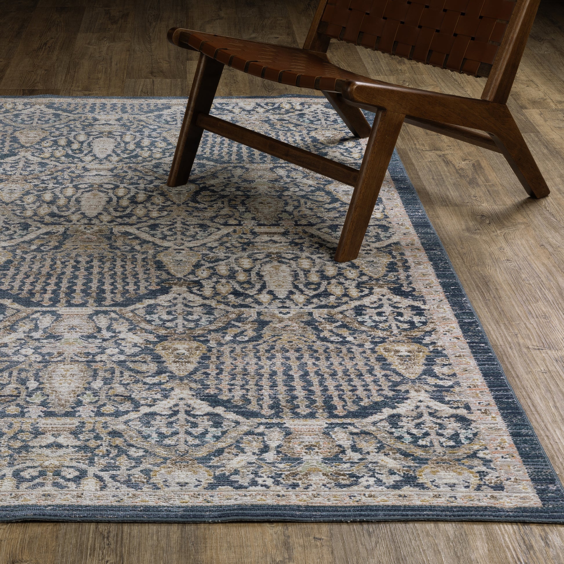 Cavett Distressed Blue/ Gold Floral Cut Pile Rug