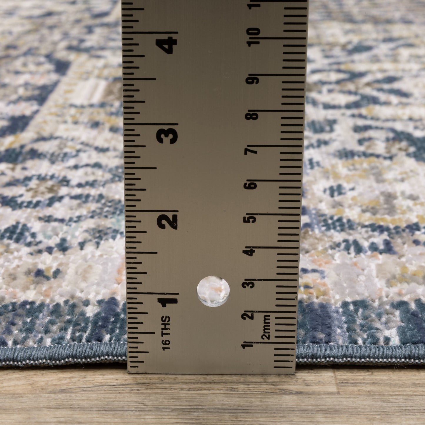 Cavett Distressed Blue/ Gold Floral Cut Pile Rug