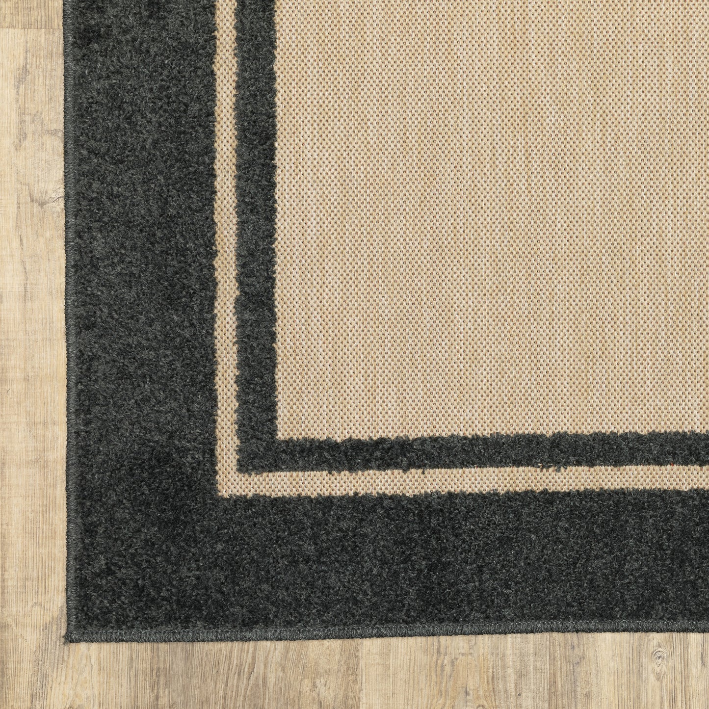 Cayman Outdoor Sand/ Charcoal Border Mixed Pile Rug