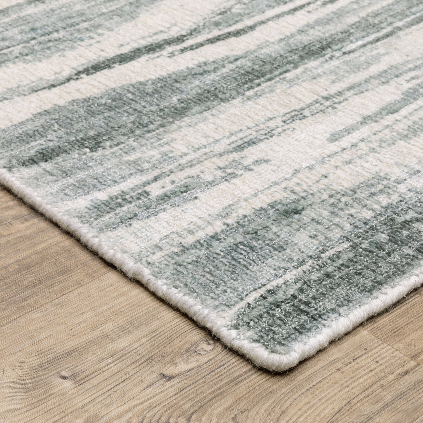 Clarke Abstract Green/ Ivory Mixed Pile Rug