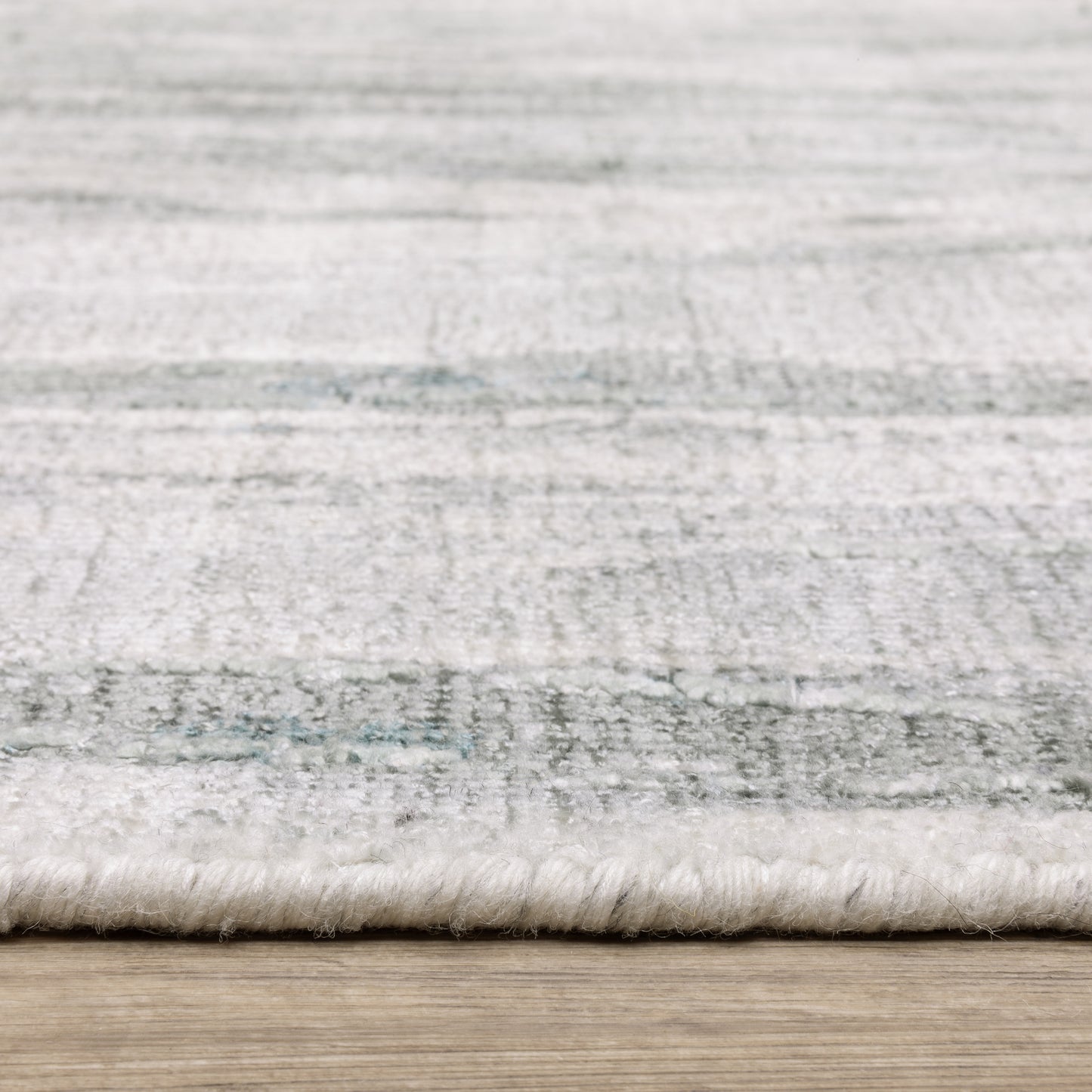 Clarke Abstract Green/ Ivory Mixed Pile Rug