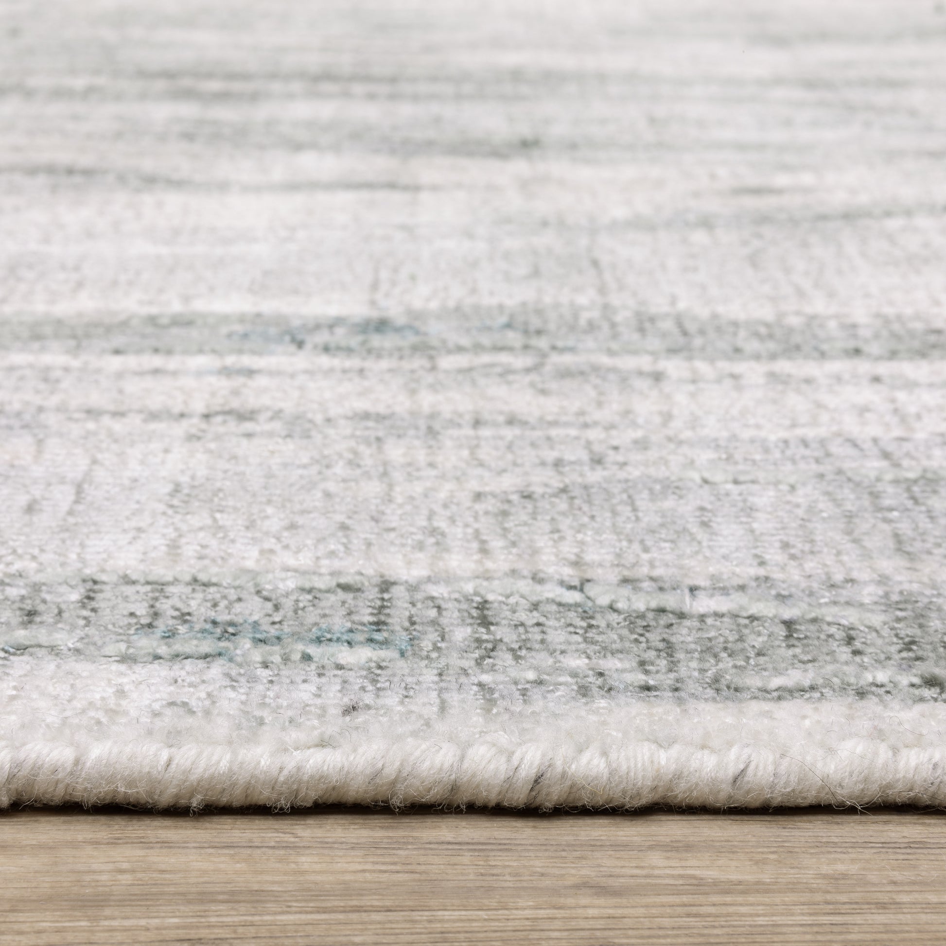 Clarke Abstract Green/ Ivory Mixed Pile Rug