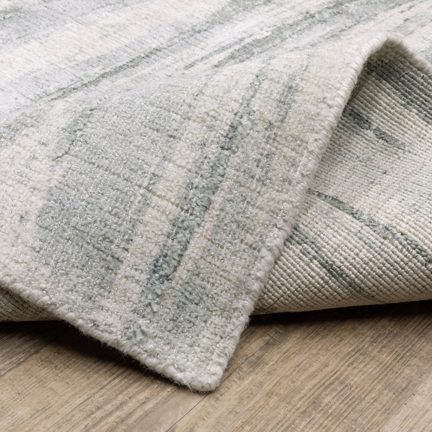Clarke Abstract Green/ Ivory Mixed Pile Rug