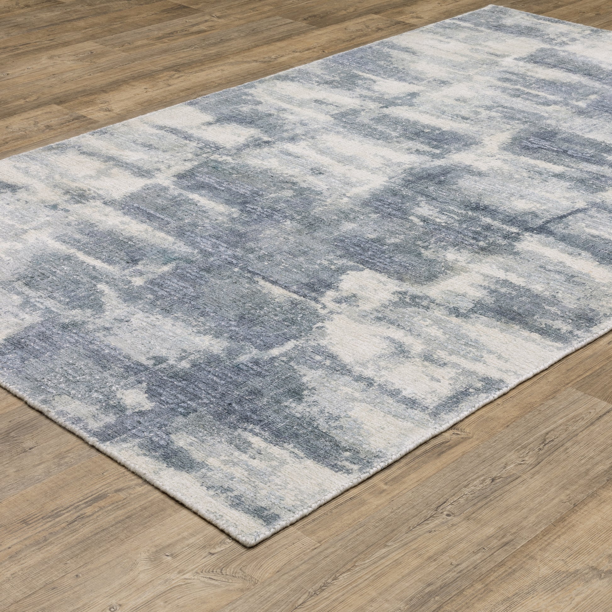 Clarke Abstract Blue/ Ivory Mixed Pile Rug