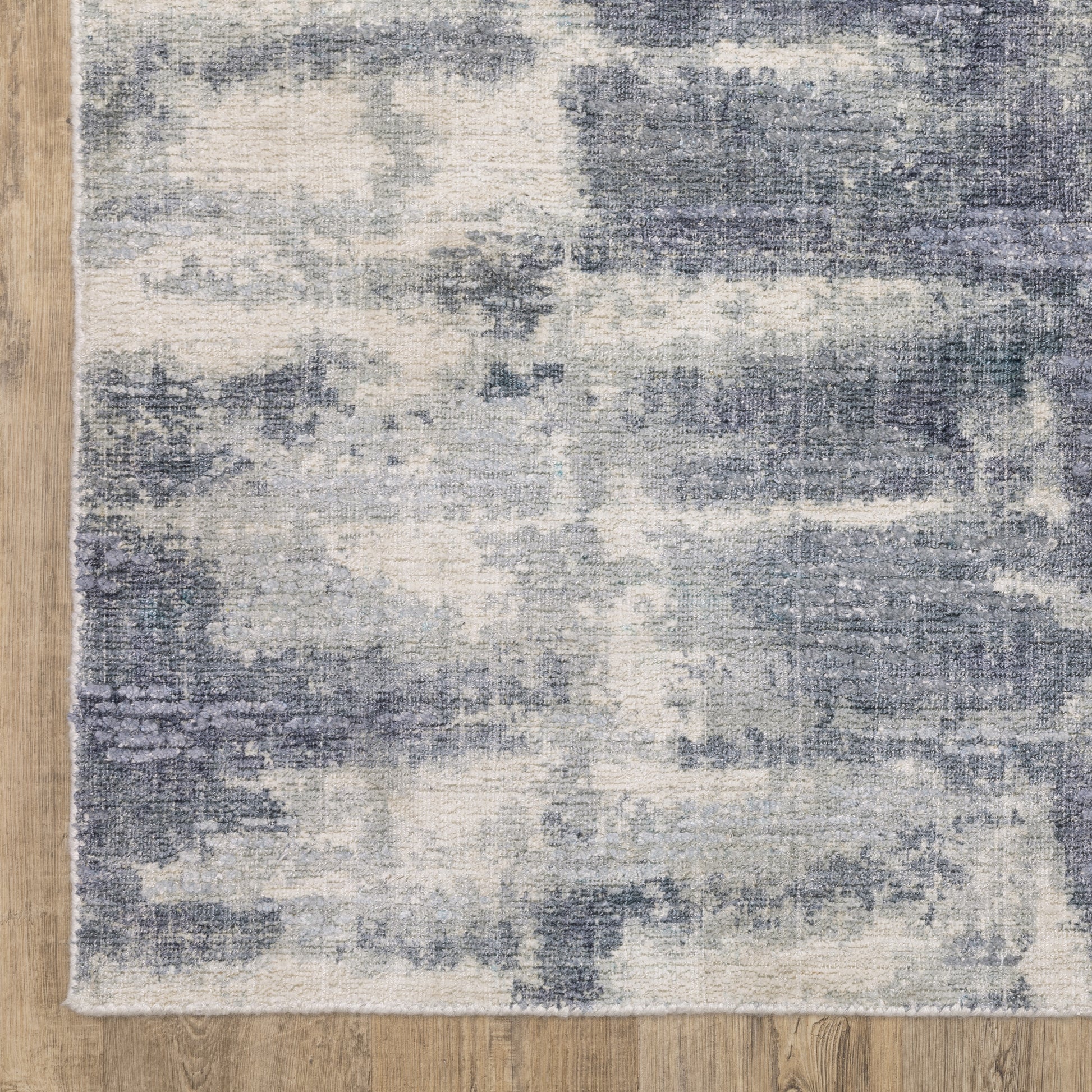 Clarke Abstract Blue/ Ivory Mixed Pile Rug