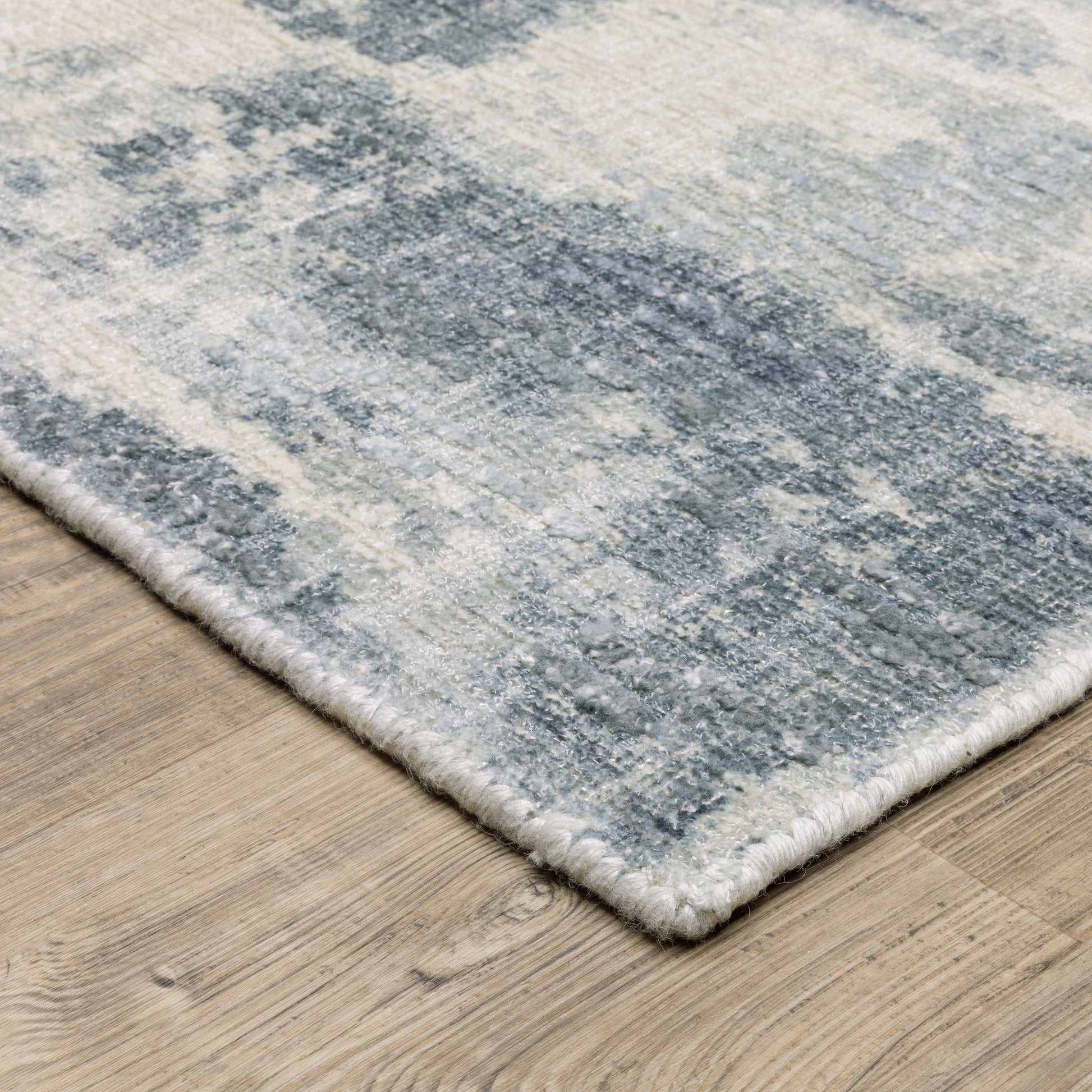 Clarke Abstract Blue/ Ivory Mixed Pile Rug