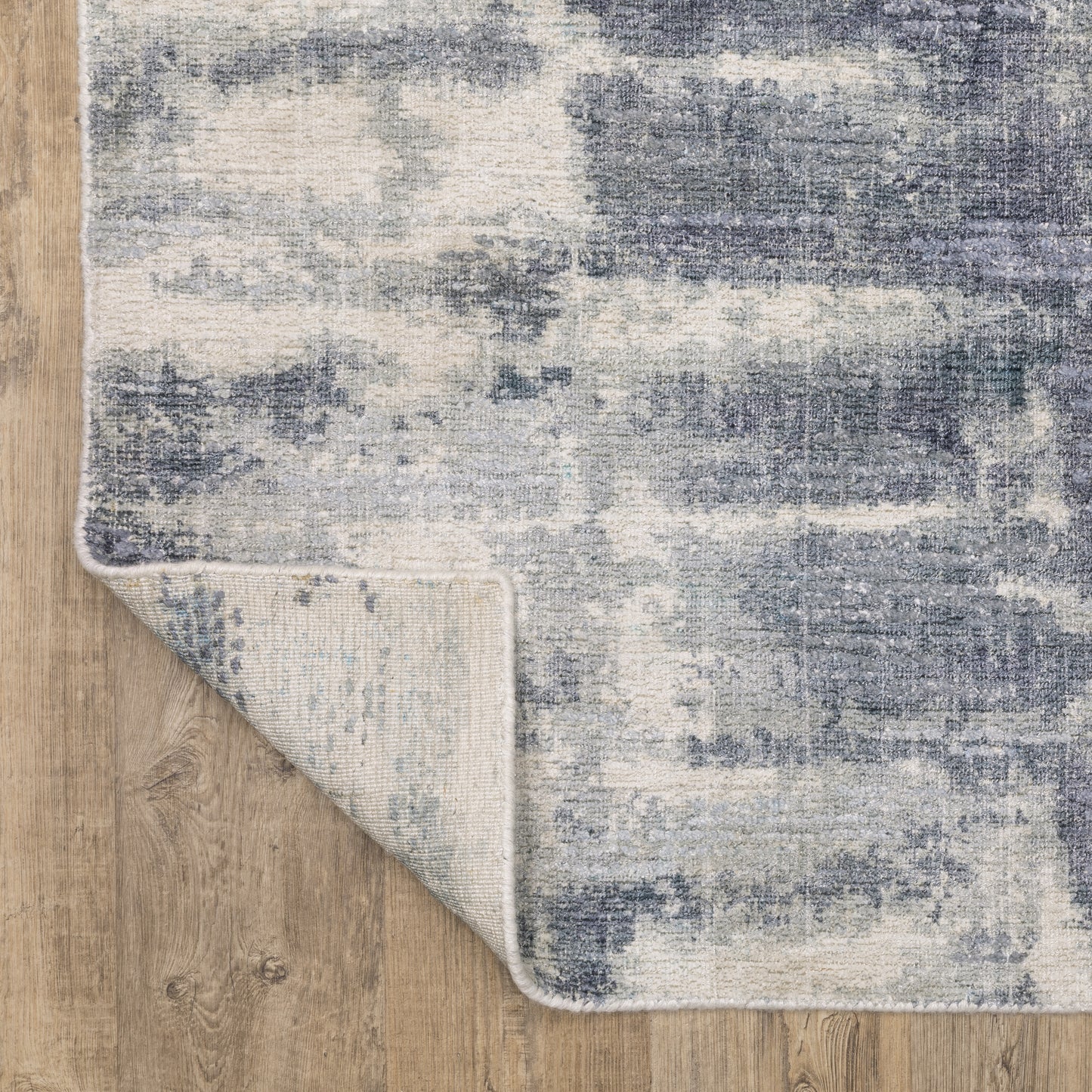 Clarke Abstract Blue/ Ivory Mixed Pile Rug