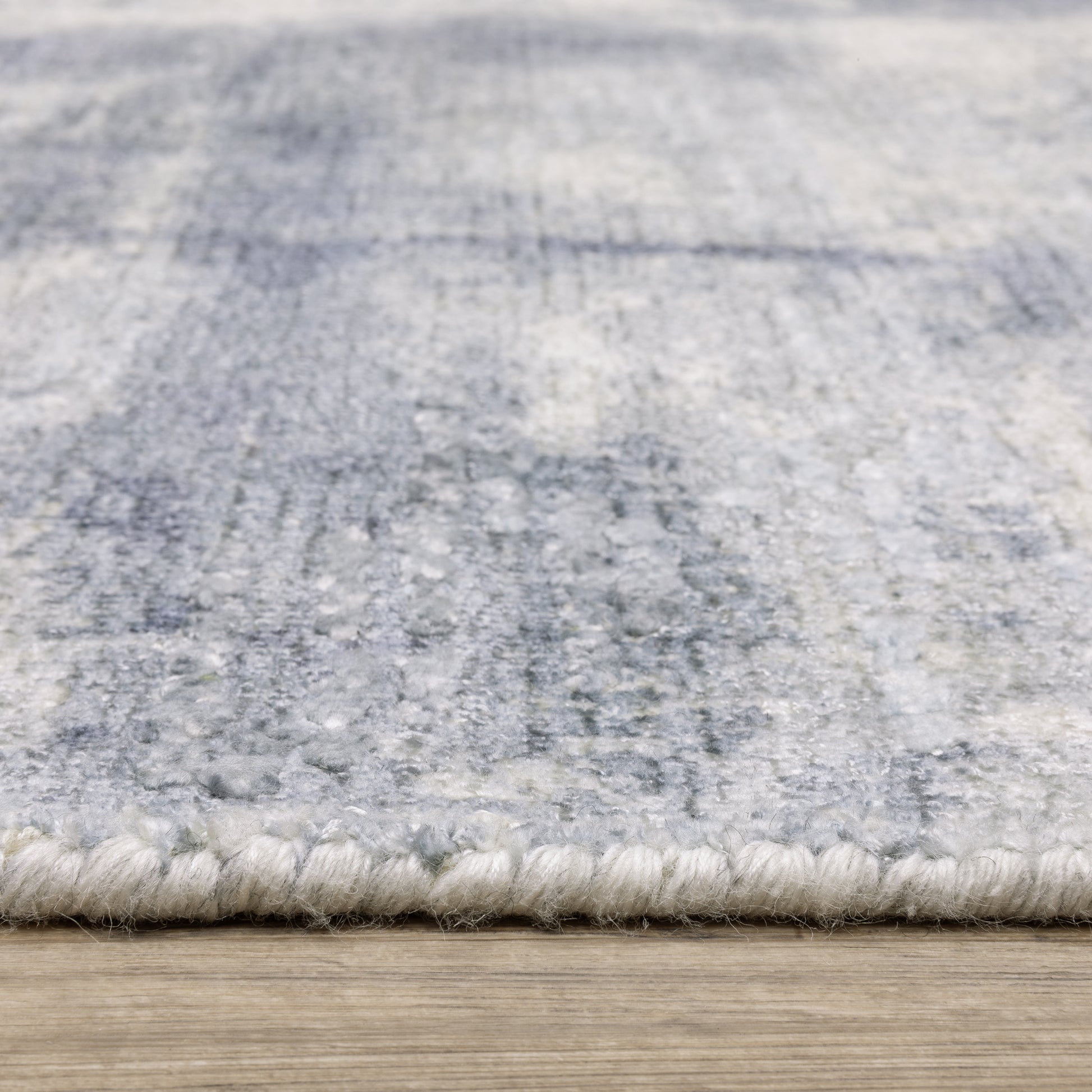 Clarke Abstract Blue/ Ivory Mixed Pile Rug