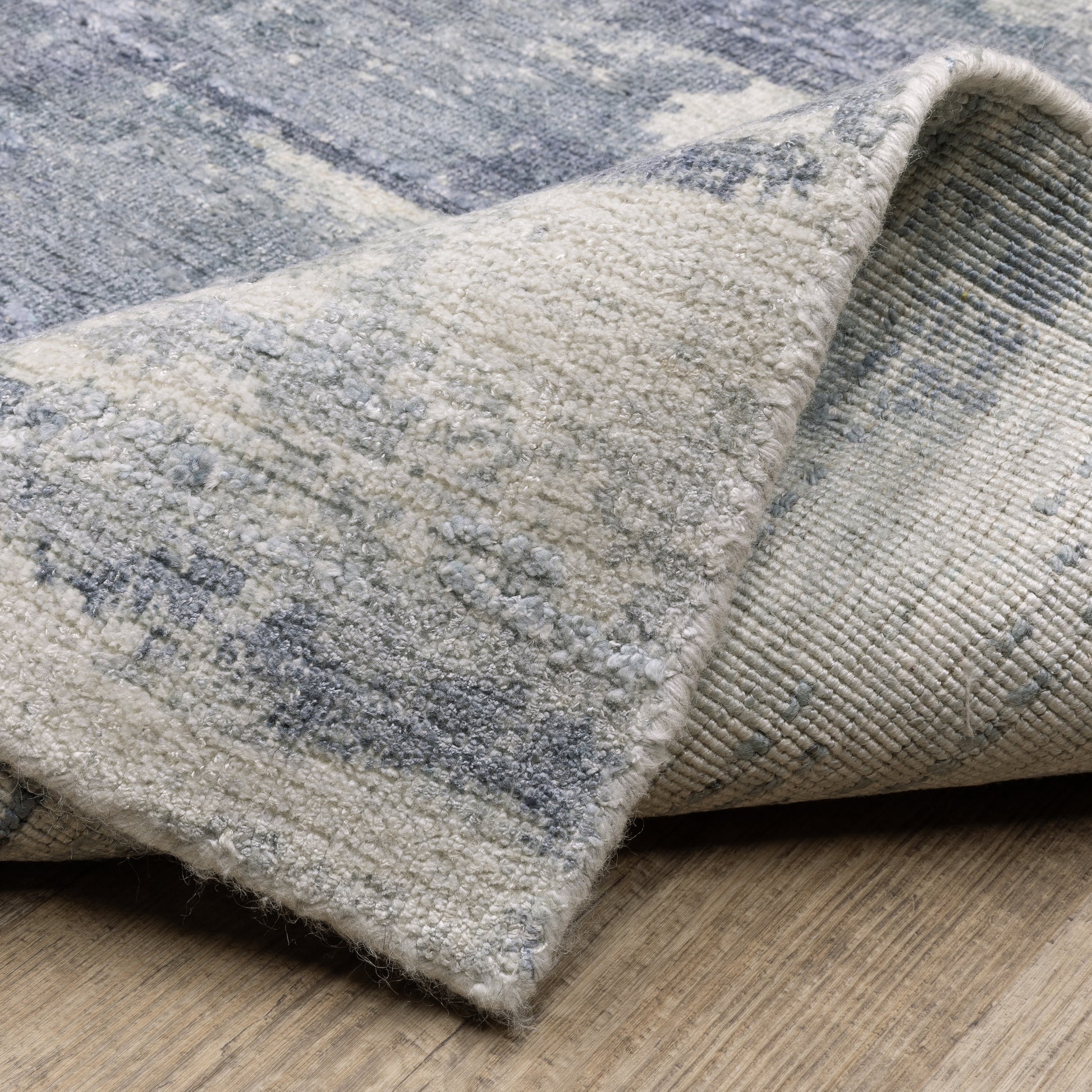Clarke Abstract Blue/ Ivory Mixed Pile Rug