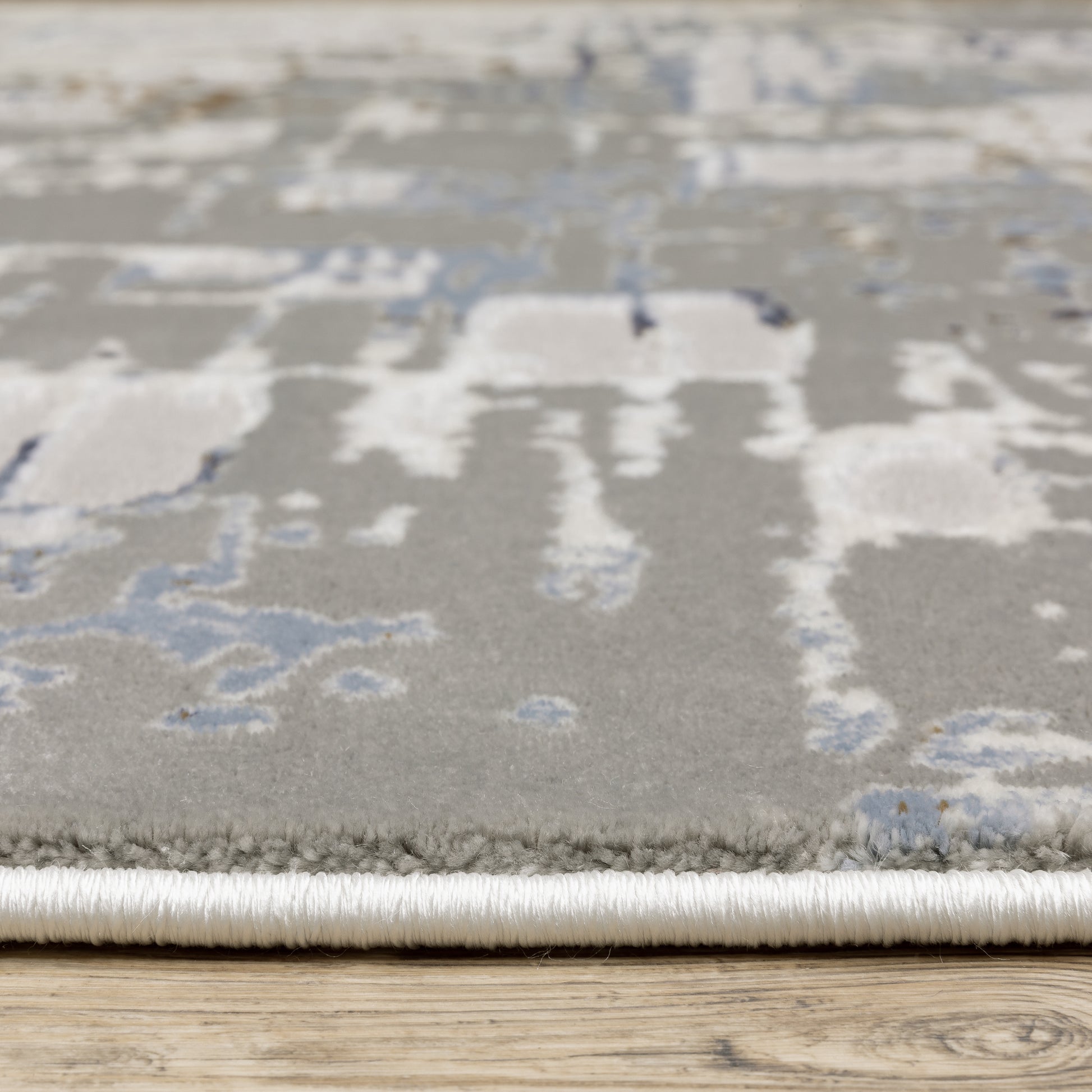 Easton Abstract Ivory/ Blue Cut Pile Rug