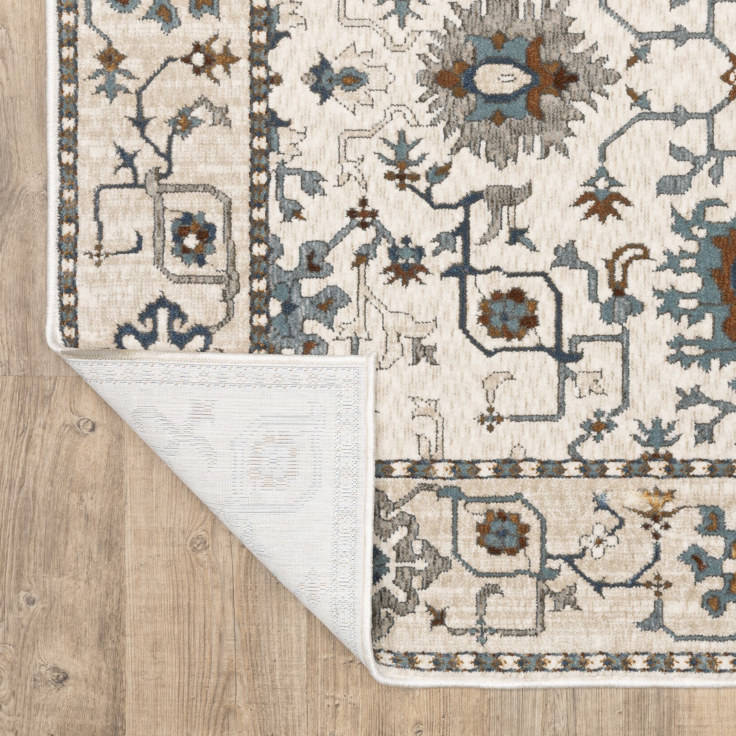 Ellington Floral Ivory/ Blue Oriental Cut Pile Rug