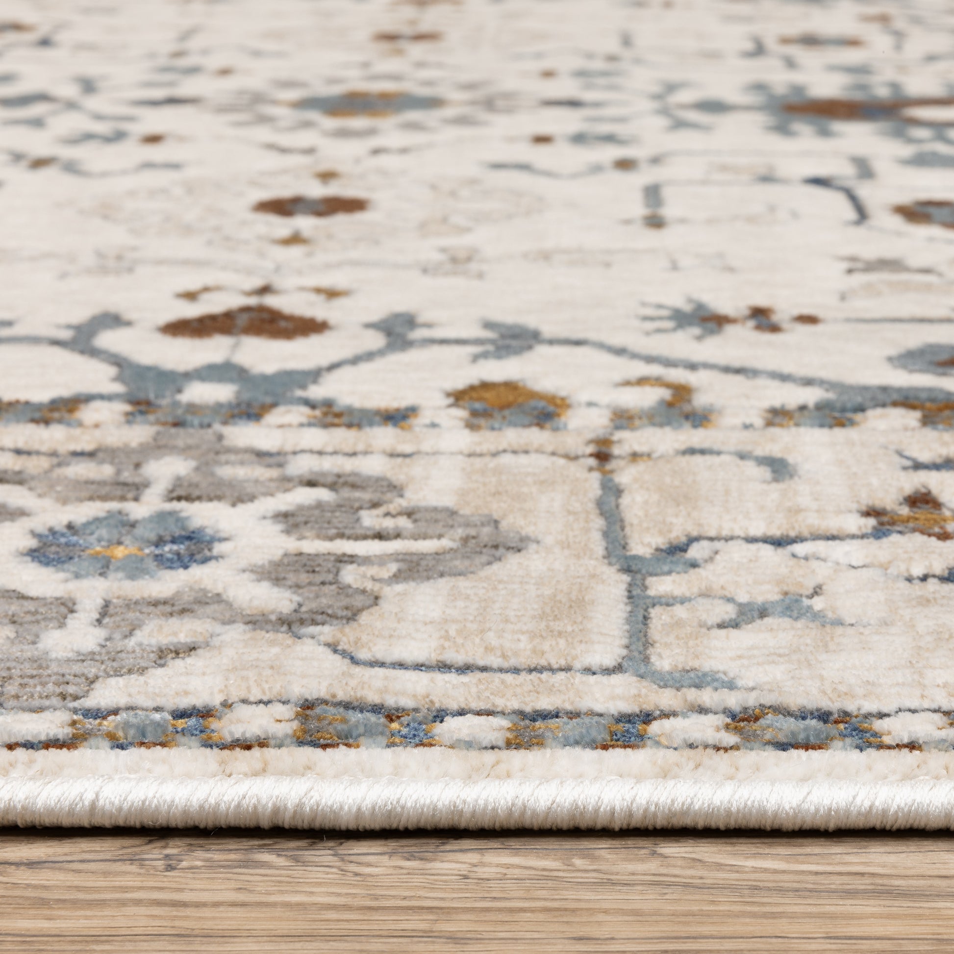 Ellington Floral Ivory/ Blue Oriental Cut Pile Rug