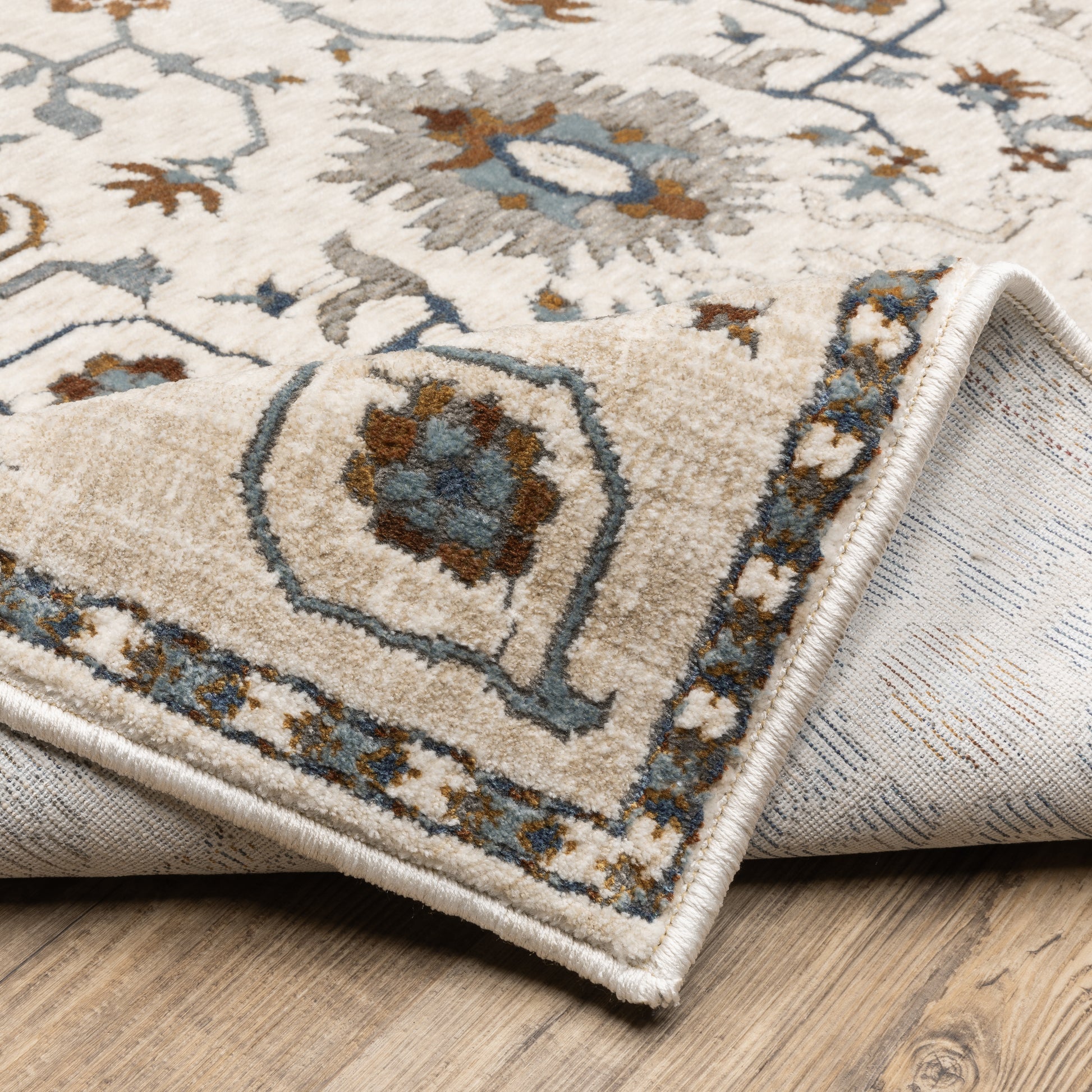 Ellington Floral Ivory/ Blue Oriental Cut Pile Rug