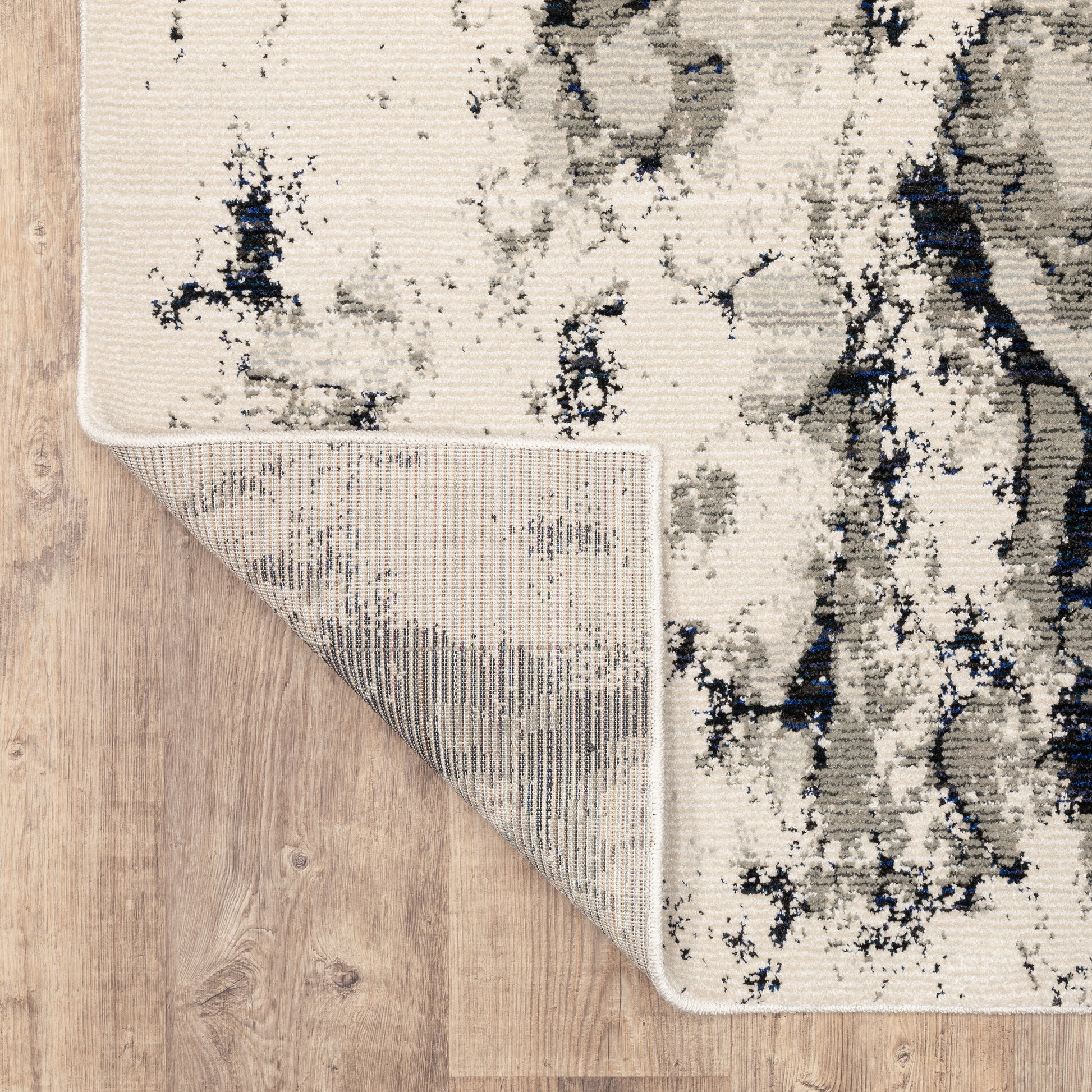 Evolution Abstract Ivory/ Beige Cut Pile Rug