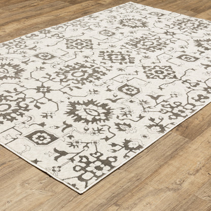 Intrigue Floral Ivory/ Grey Oriental Cut Pile Rug