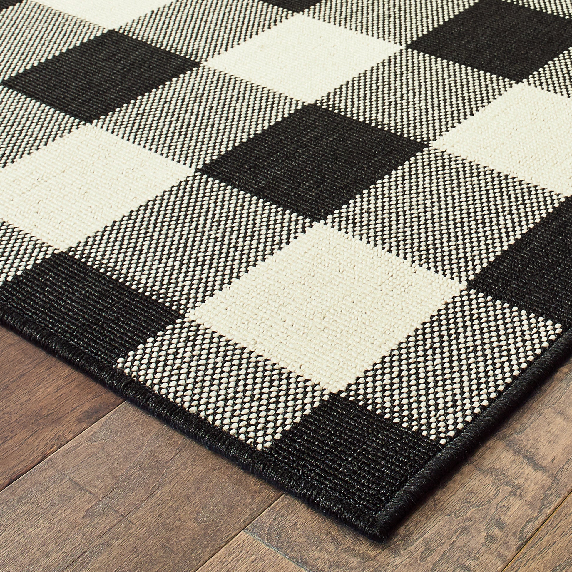 Marina Outdoor Black/ Ivory Southwest/Lodge Loop Pile Rug
