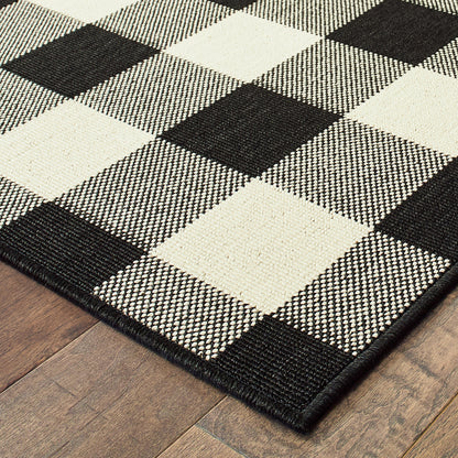 Marina Outdoor Black/ Ivory Southwest/Lodge Loop Pile Rug
