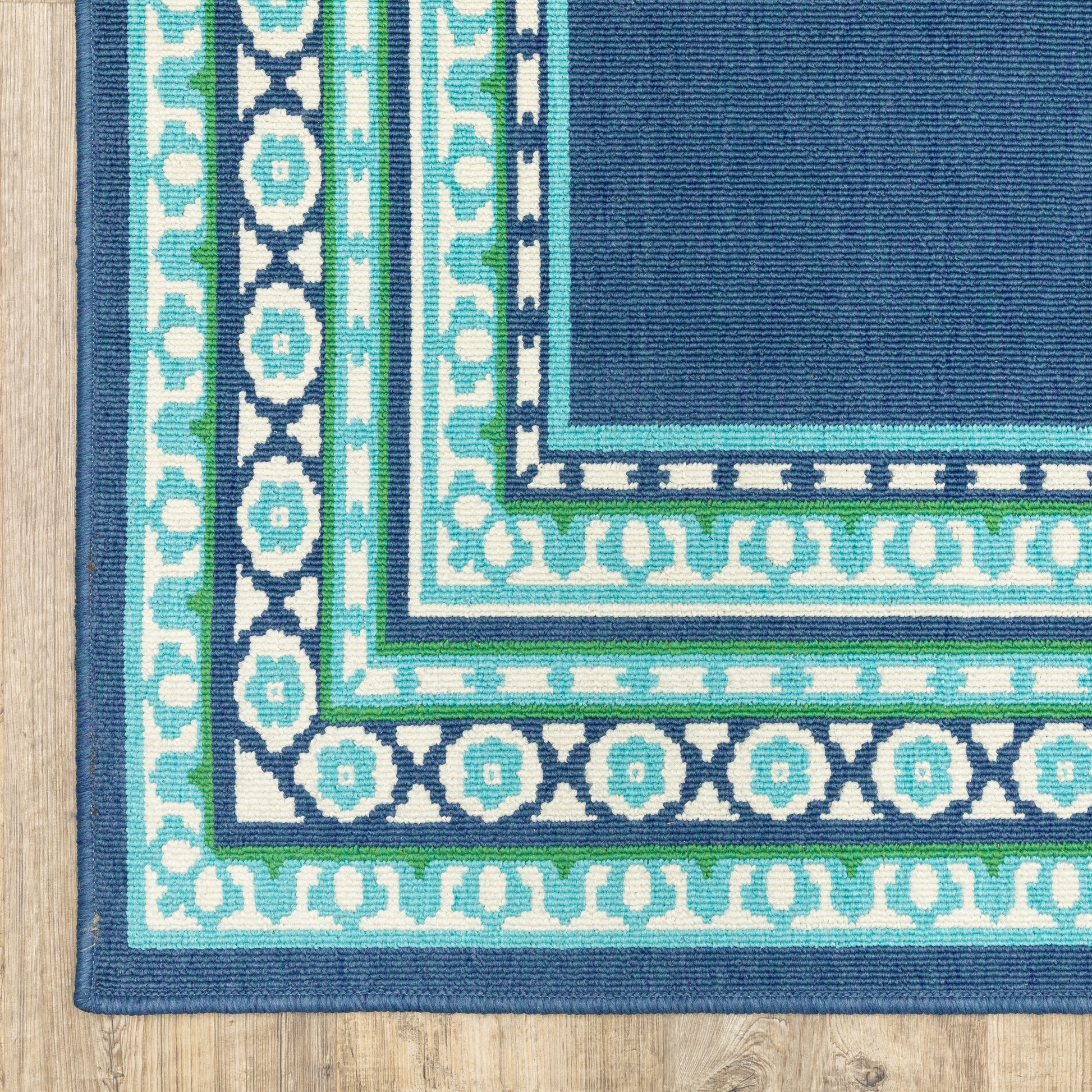 Meridian Outdoor Navy/ Green Border Loop Pile Rug