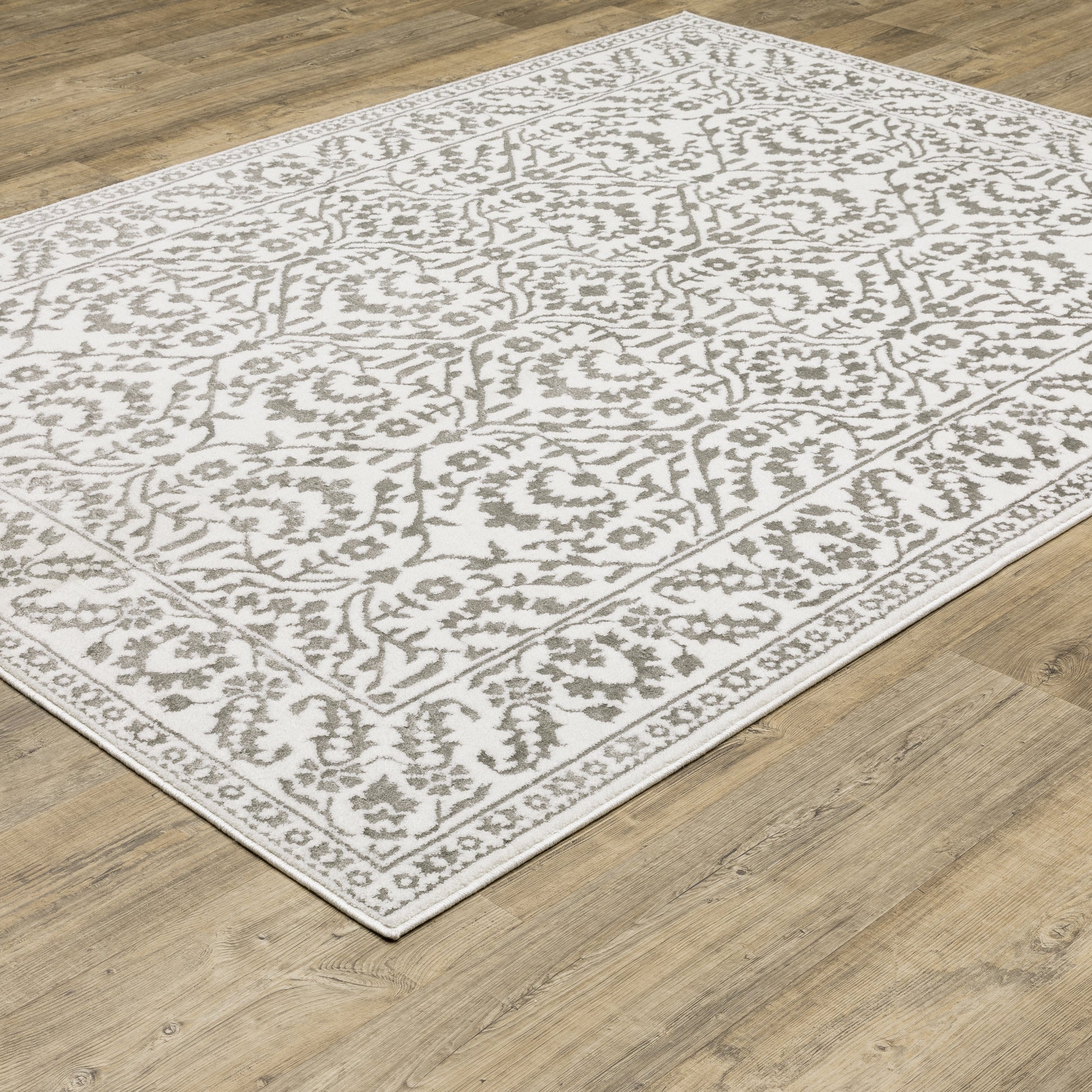 Montecito Border Grey/ White Floral Cut Pile Rug