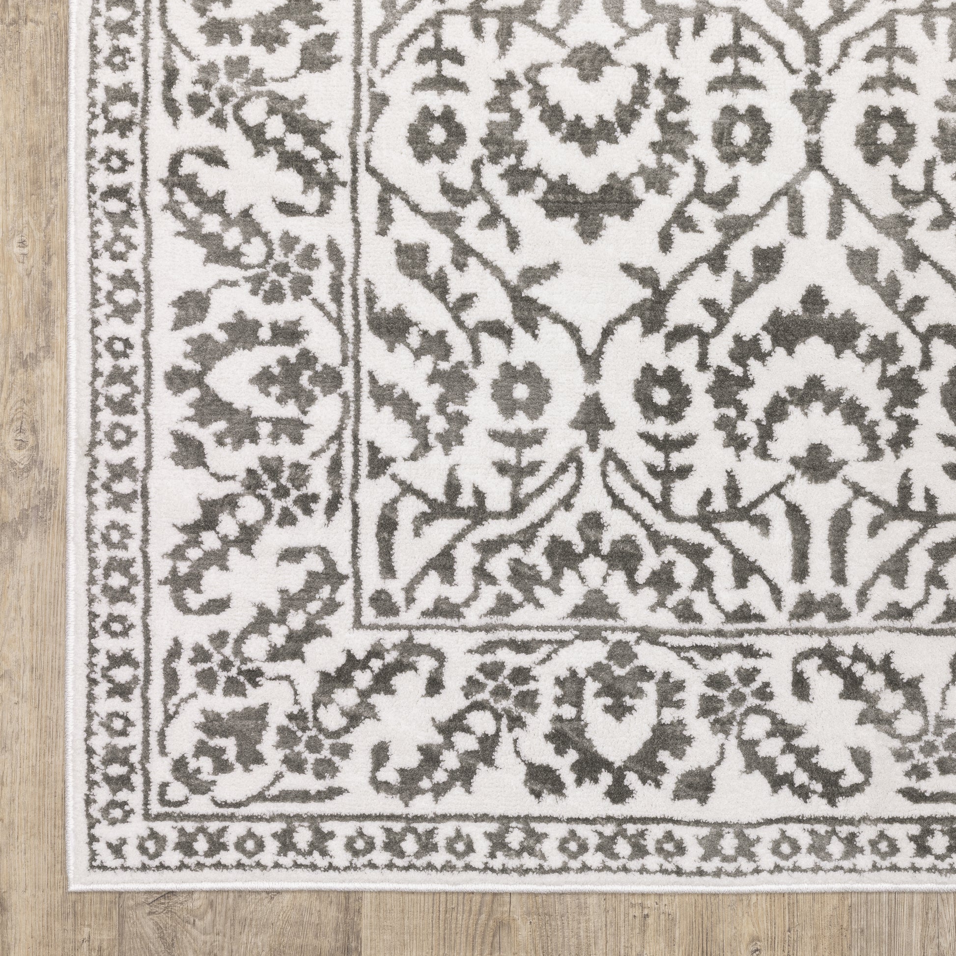 Montecito Border Grey/ White Floral Cut Pile Rug
