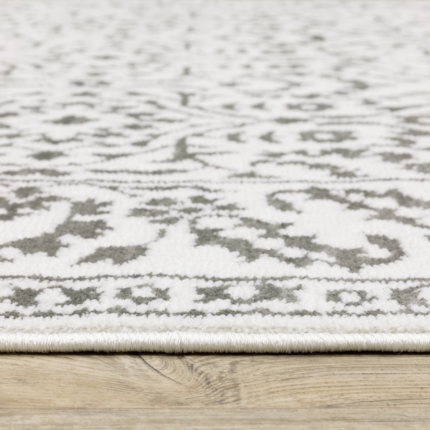 Montecito Border Grey/ White Floral Cut Pile Rug