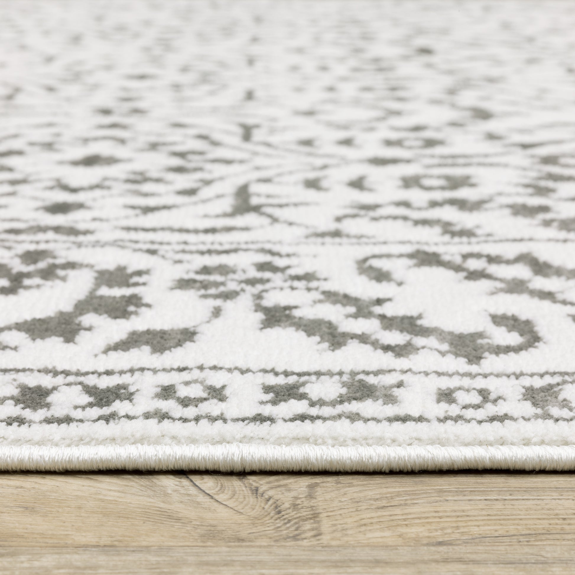 Montecito Border Grey/ White Floral Cut Pile Rug